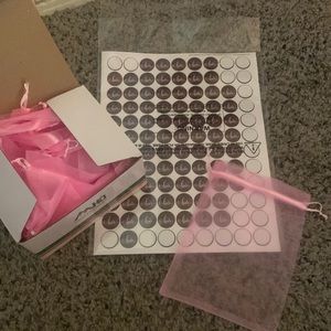 Wedding prep bags and stickers.